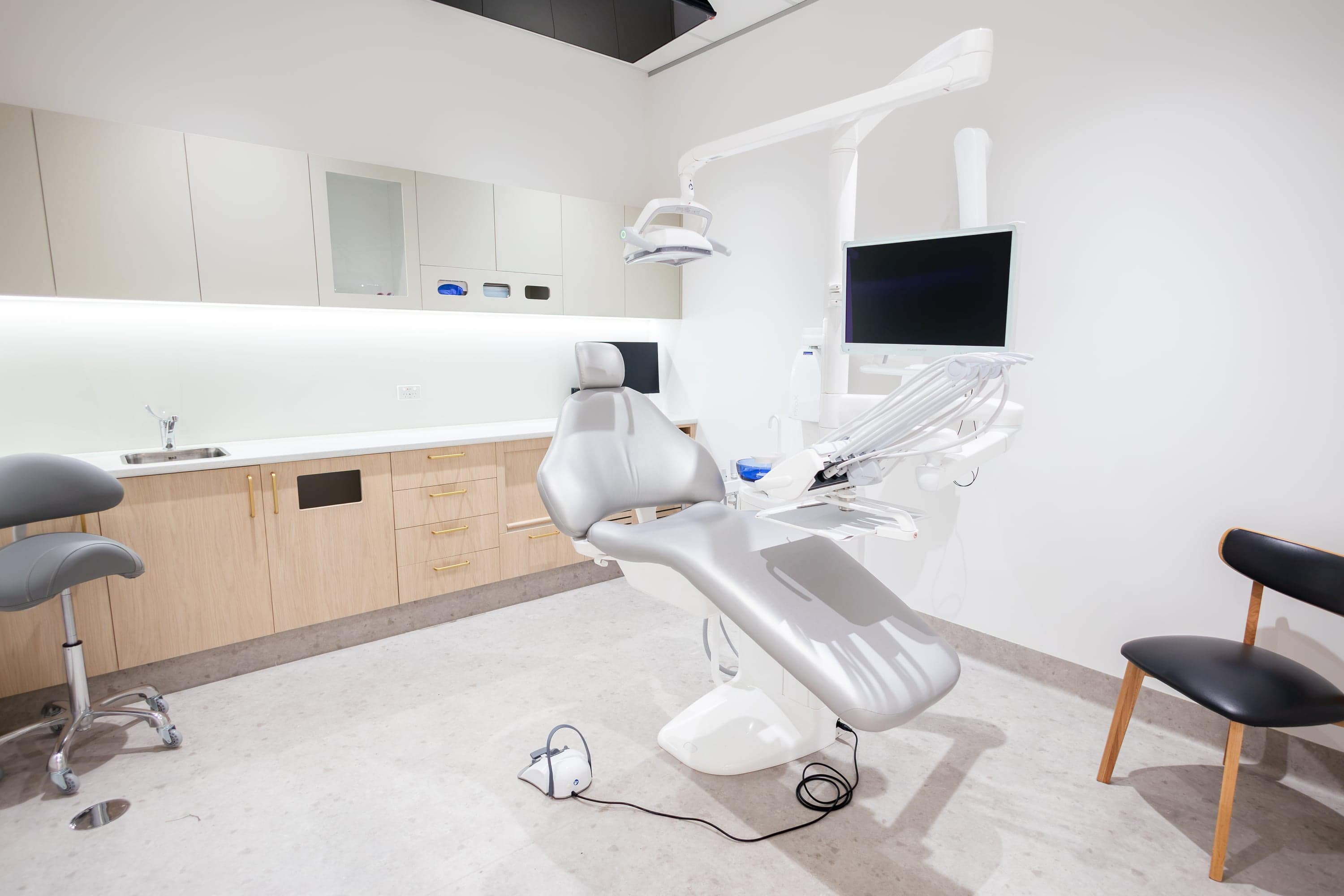 Warm waiting area at Joyner Family Dental with natural light