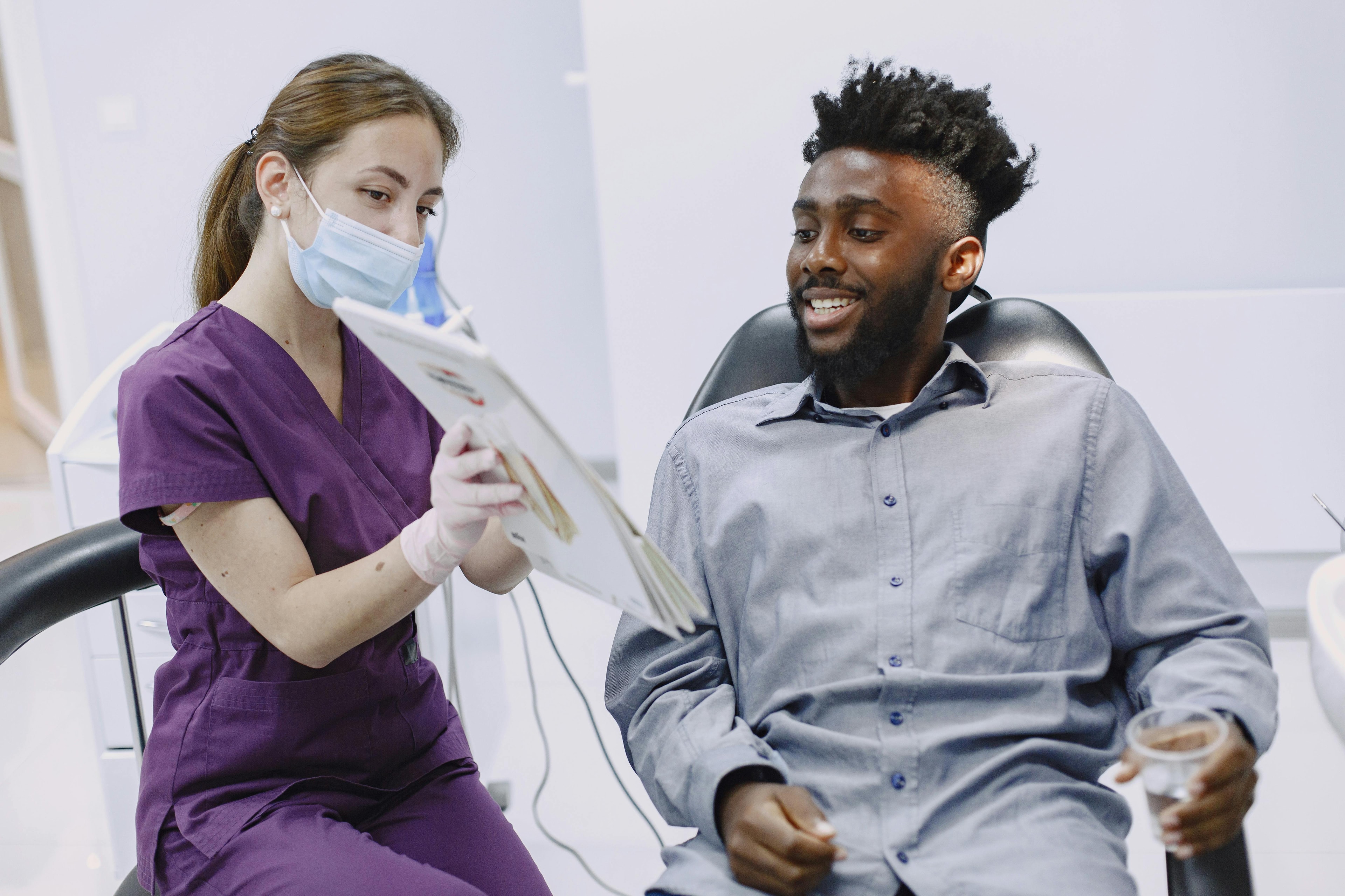 Dentist in conversation with a patient at Joyner Family Dental