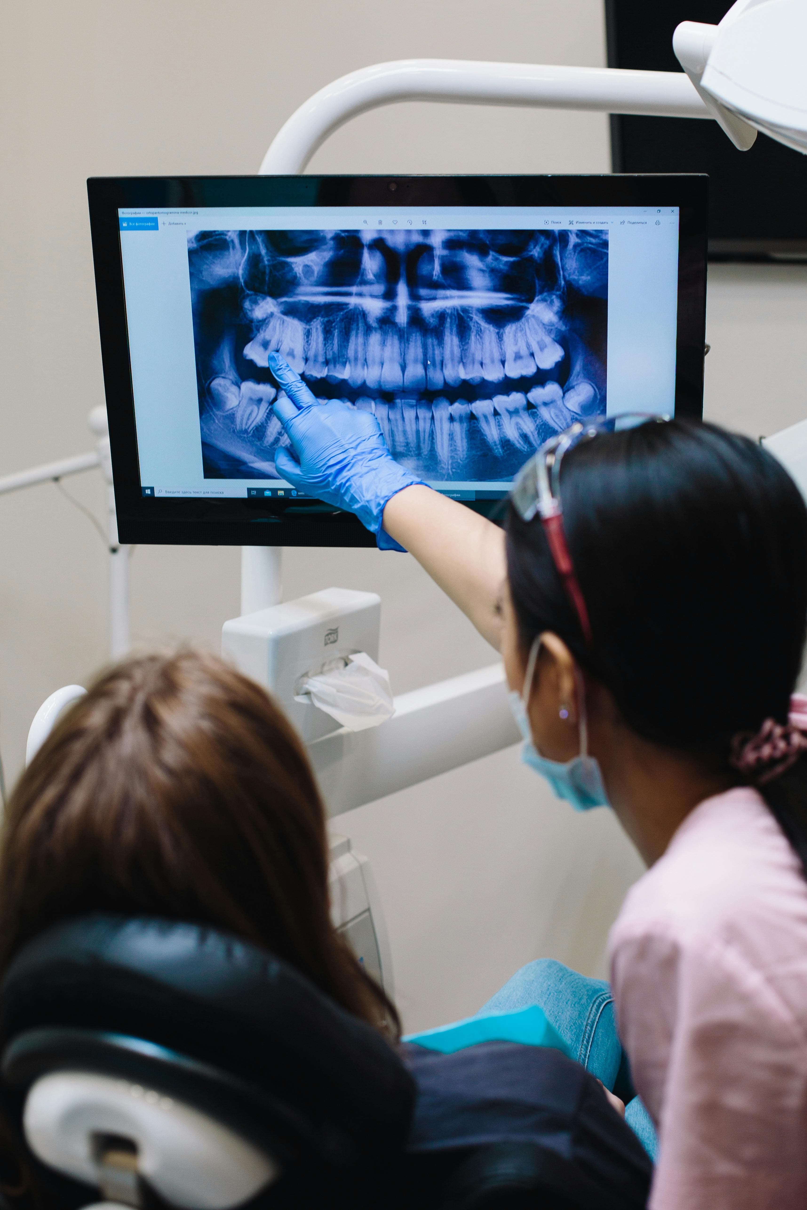 Receptionist answering an emergency dental call at Joyner Family Dental
