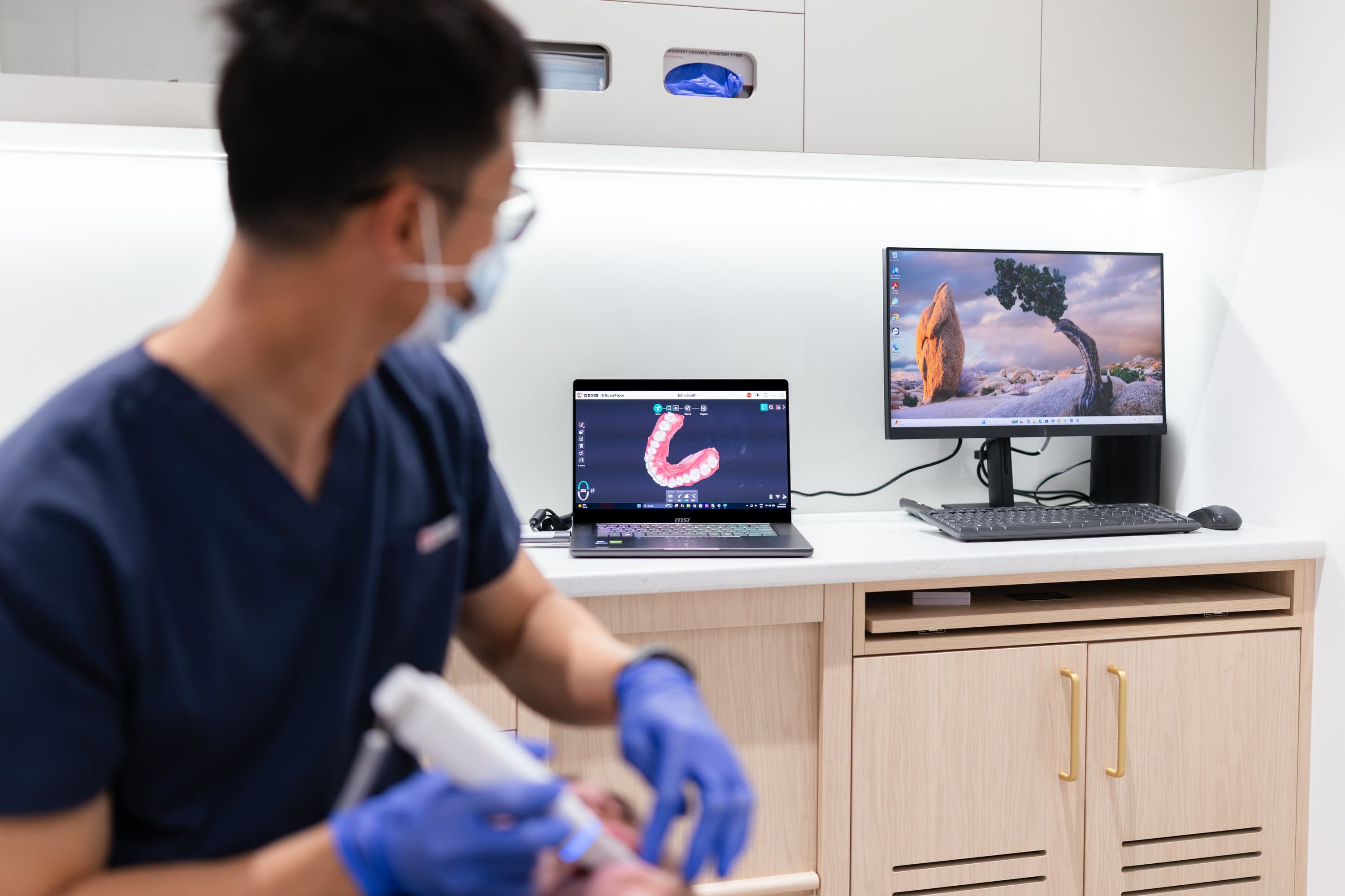 Dentist reviewing gum health assessment findings with a patient